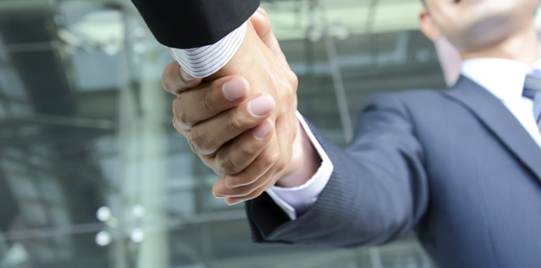 Handshake of businessmen - success, congratulation, greeting & business partner concepts
